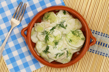 Cucumber salad with sour cream and fresh dill
