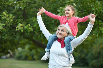 Little  girl with grandmother  in  park