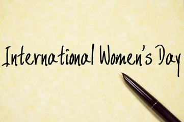 international women's day text write on paper