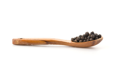 Black pepper with wood spoon