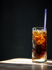 glass of cola with ice