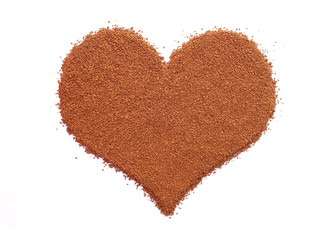 Instant coffee granules in a heart shape