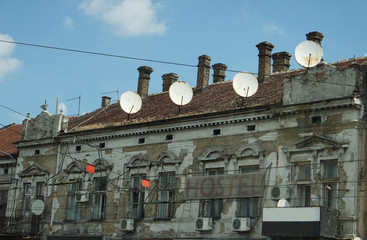 Old house occupied by satellite antennas