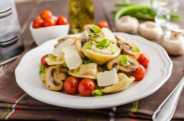 Tortellini stuffed with a mixture of vegetable spring