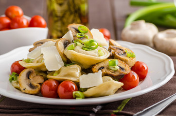 Tortellini stuffed with a mixture of vegetable spring