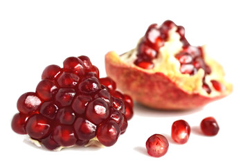 Fresh pomegranate on white background