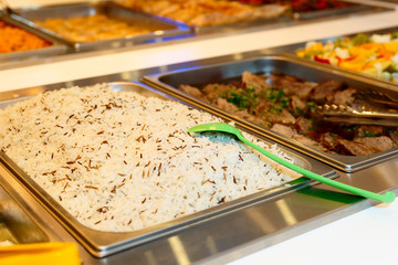 Rice and meat in self-service restaurant