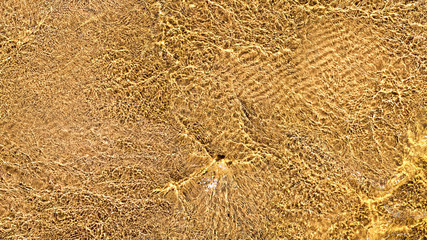 Shining ripples on the surface of water