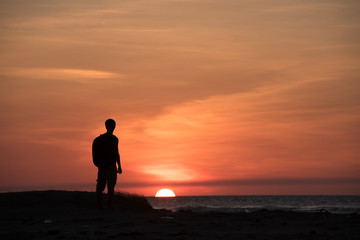 Fototapeta na wymiar Silhouette man with sunset