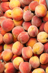 Ripe peach fruit background, close up