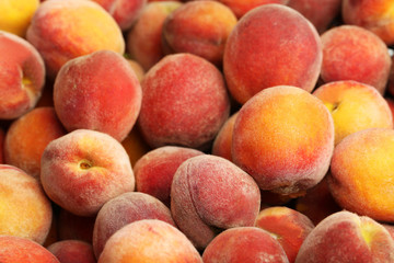 Ripe peach fruit background, close up