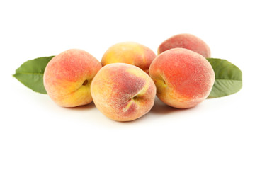 Fresh peaches fruit isolated on a white