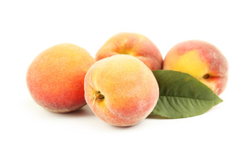 Fresh peaches fruit isolated on a white