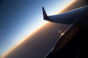 wing aircraft at sunset