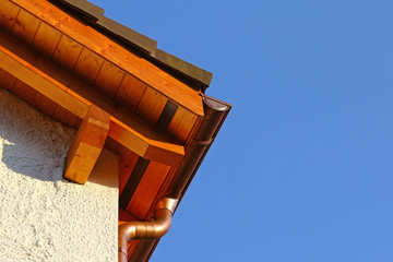 New roof top detail with ceramic tiles and copper water gutter