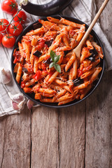 Italian food: Pasta alla Norma and ingredients. vertical top view
 - obrazy, fototapety, plakaty