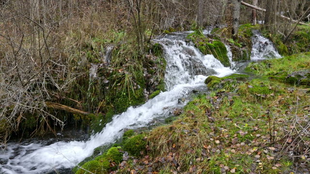 Natural   waterfall at river  in winter. Cuenca, Spain
