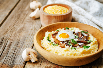 polenta with caramelised mushrooms, egg, cilantro and cheese