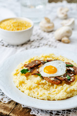 polenta with caramelised mushrooms, egg, cilantro and cheese
