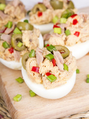 stuffed eggs with tuna, olives and paprica