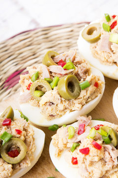 stuffed eggs with tuna, olives and paprika
