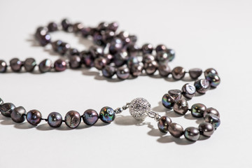 Black pearl necklace with diamond pendant