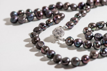 Black pearl necklace with diamond pendant