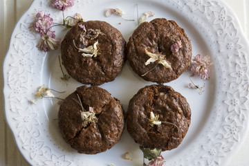 Delicious brownie decorated with pink flowers