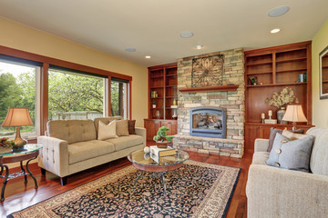 Traditional living room with hardwood floor.