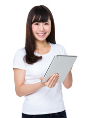 Asian Young woman use of the tablet pc