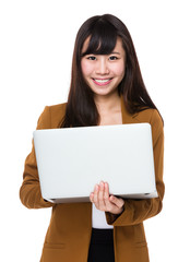 Businesswoman use of the laptop computer