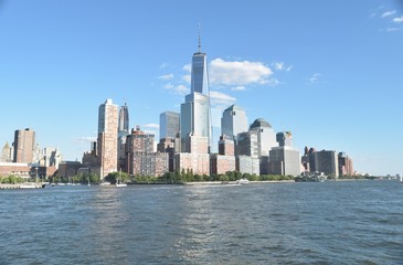 Fototapeta na wymiar Freedom Tower in lower Manhattan, New York USA A view from Hudson river.