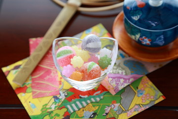 Japanese candies.They are called ”Amedama" and ”Konpeitoh”. It's multicolored and includes the pretty design. It's popular with Japanese children from the old days.