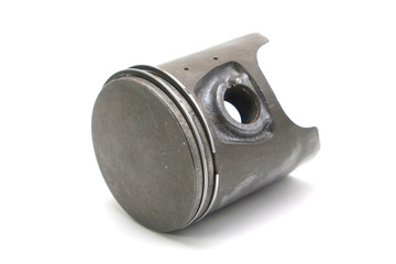 Old engine piston isolated on white background