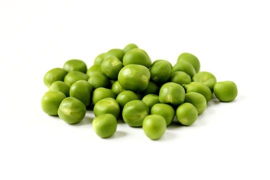 Green peas macro on a white background
