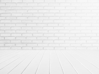 interior of white brick wall with white wooden floor.