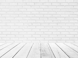 interior of old white brick wall with old white wooden floor.