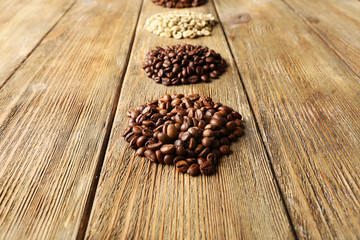 Coffee beans on wooden background