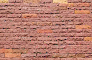 Orange brick wall background.