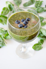 Green Cocktail with berries on top