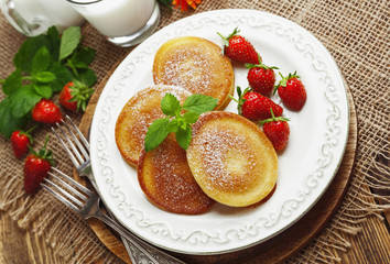 Homemade pancake with sugar powder