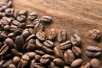 Coffee beans on wooden background
