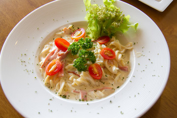 Pasta Carbonara with cherry tomatoes bacon and cheese