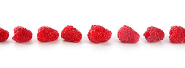 Red sweet raspberries isolated on white