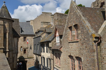 Fototapeta na wymiar Ancient village on Mont Saint Michel, traditional stone building, France