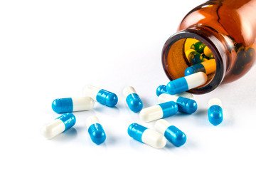 blue capsules with  bottle, healthcare and medicine