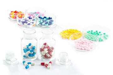 Obraz na płótnie Canvas colorful capsule in Pill Container, Healthcare And Medicine