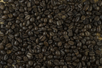 Coffee beans on wood block