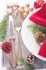Christmas table place setting with decorations