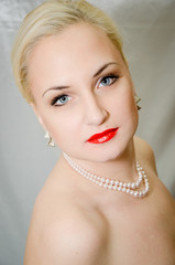 Portrait of sexy young woman with red lips